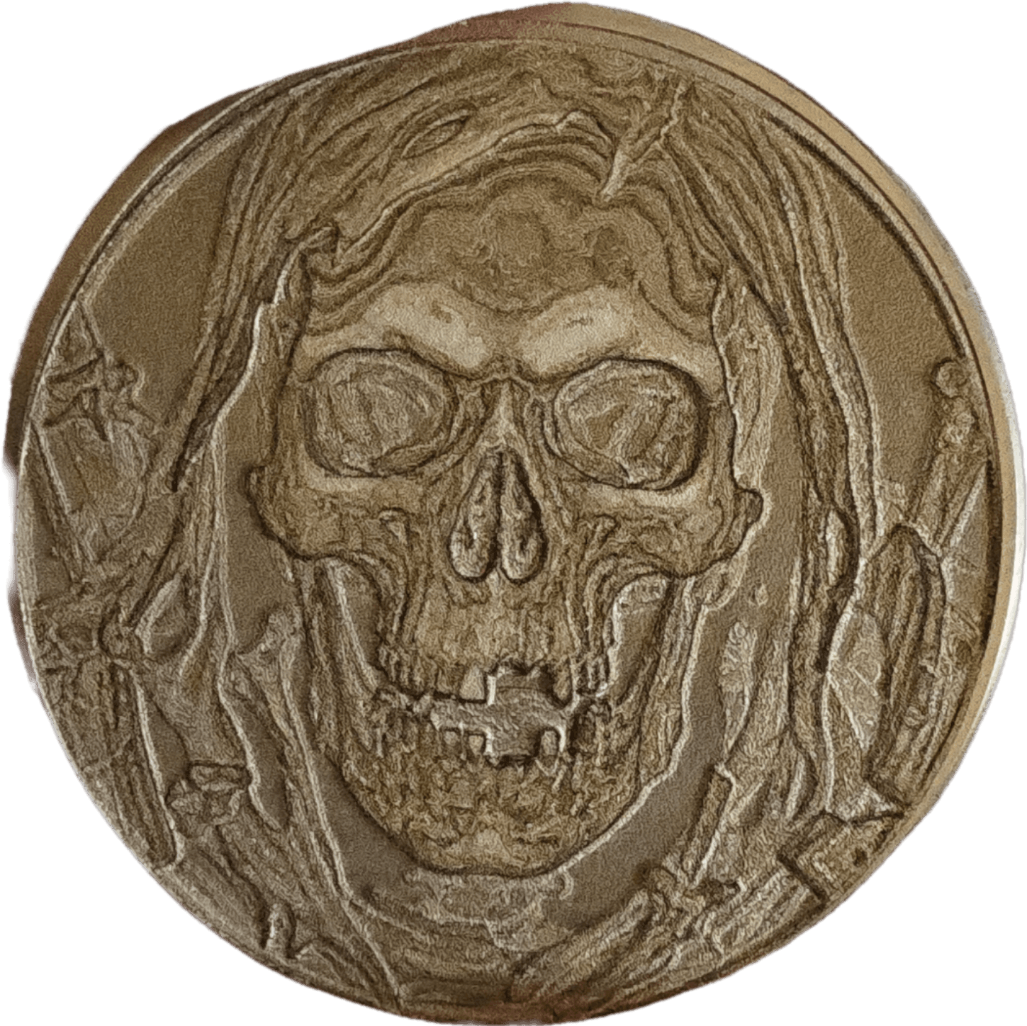 Round engraved collectible featuring a detailed skull design